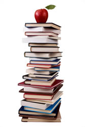 A Stack of Books with an Apple on the Top